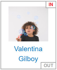 Profile pic of Young boy blowing soap bubbles